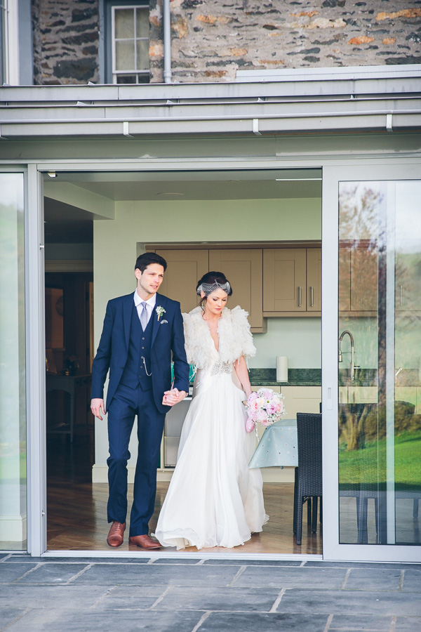 Bride and Groom return to the reception