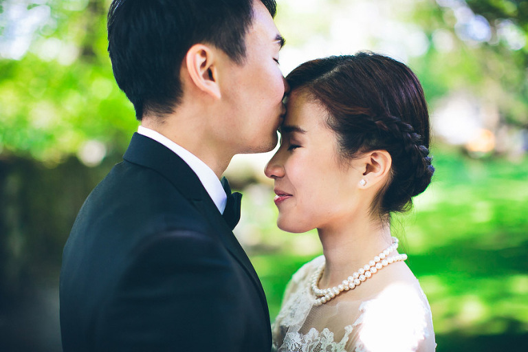 bride and groom kiss