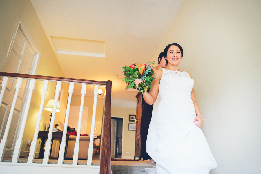 Bride coming down stairs