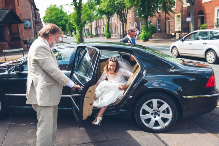 Bride and wedding car
