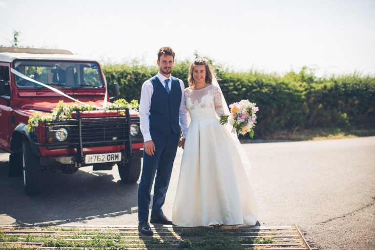 bride and groom three hills barn