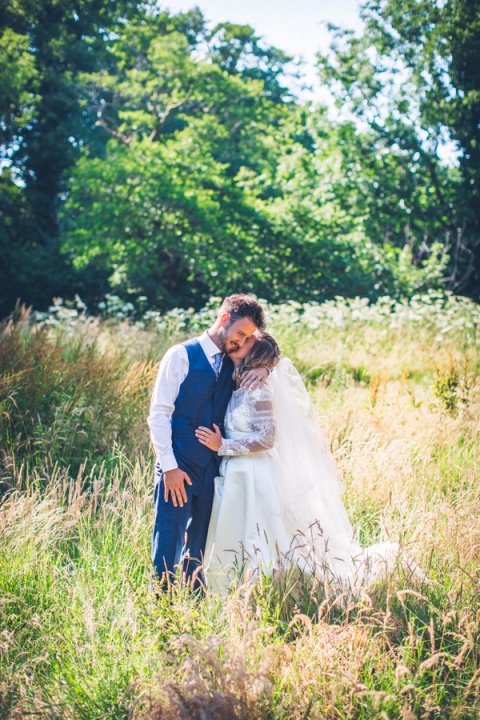 bride and groom three hills barn